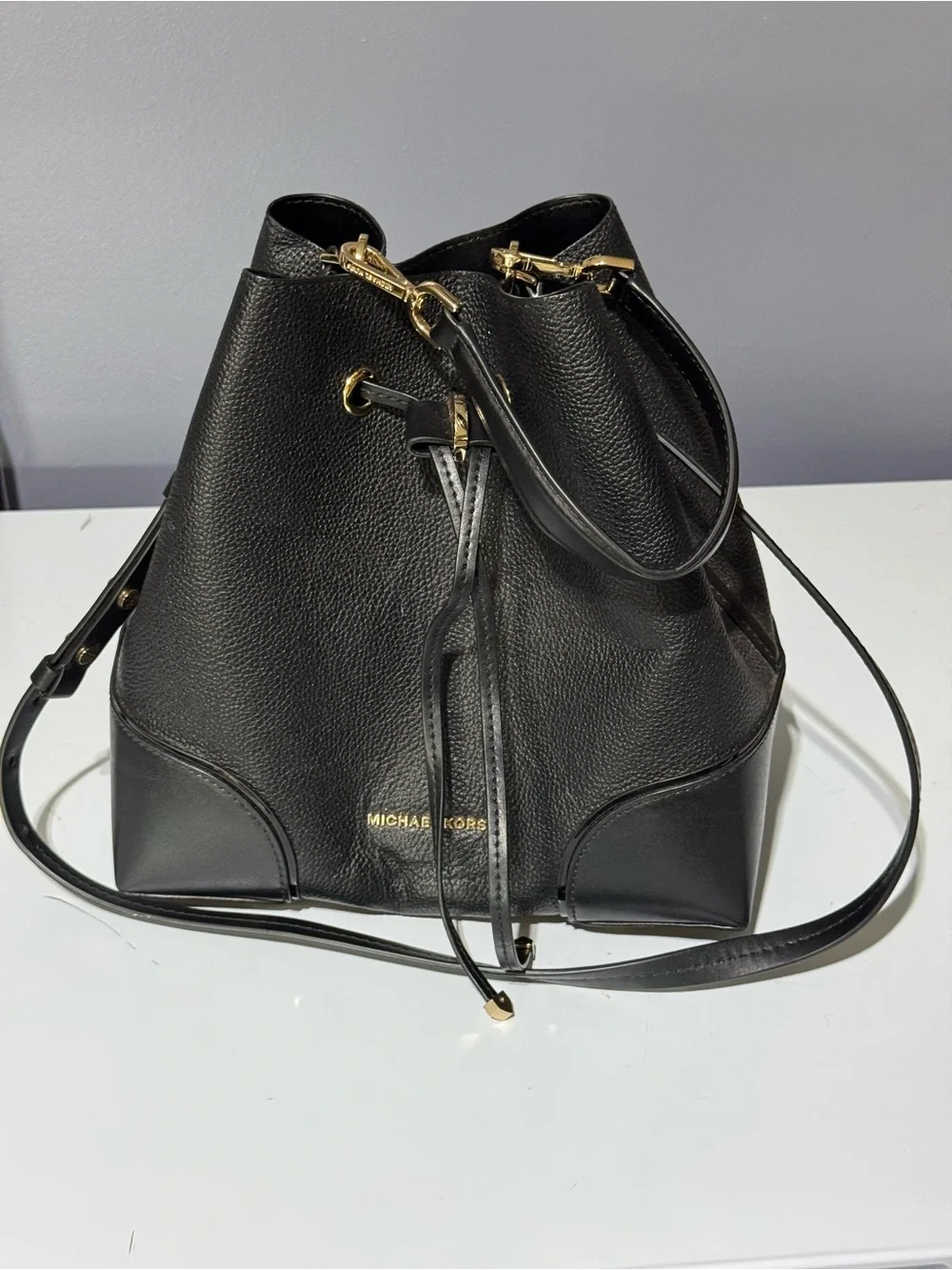MICHAEL KORS Black Leather Drawstring Bucket Shoulder Bag with Gold Hardware